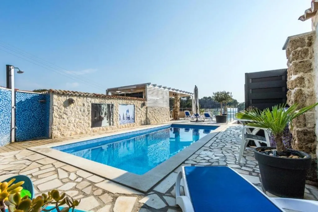 Image of Apartments with a swimming pool Sibenik – 22457